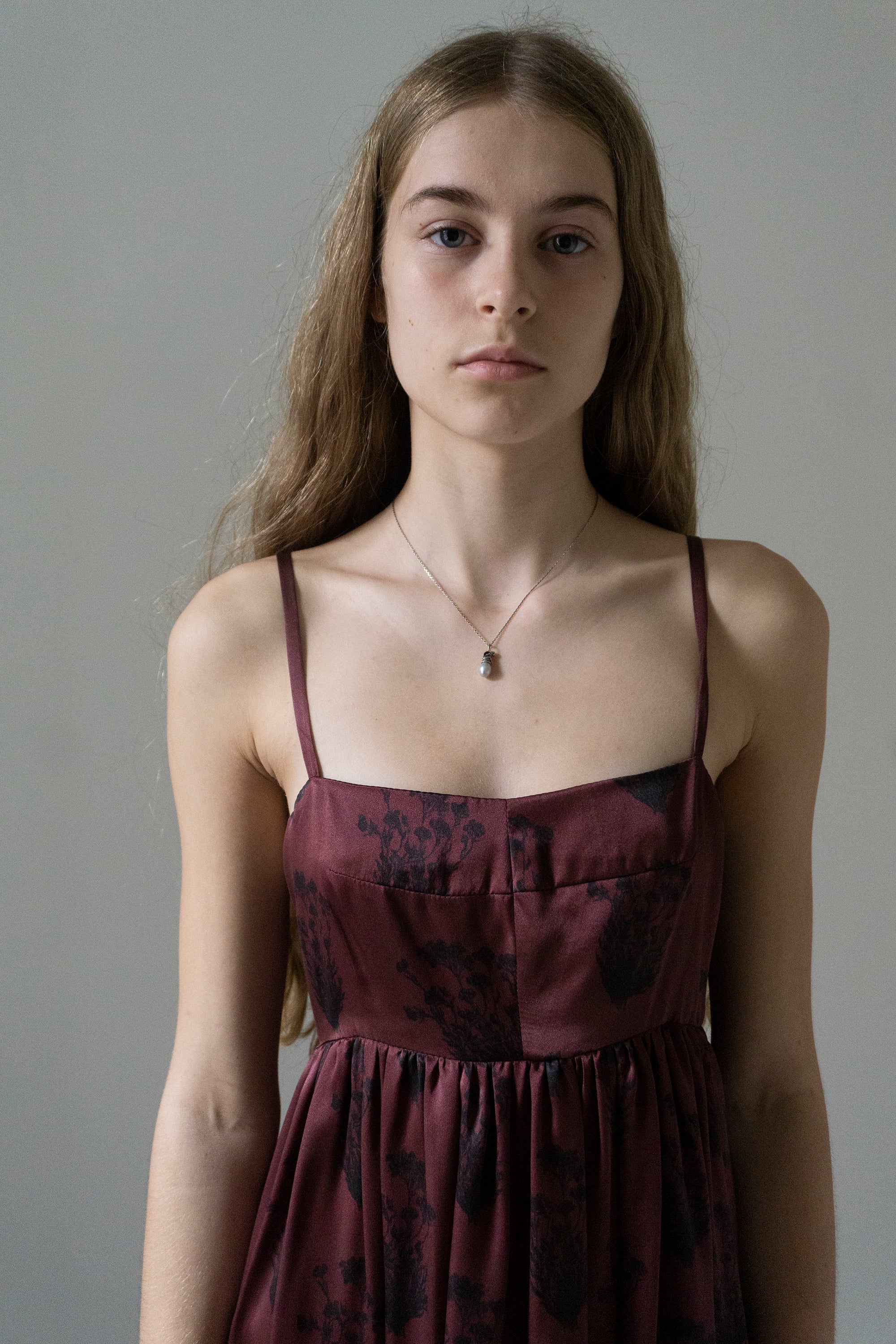Cherub on a Pearl Necklace